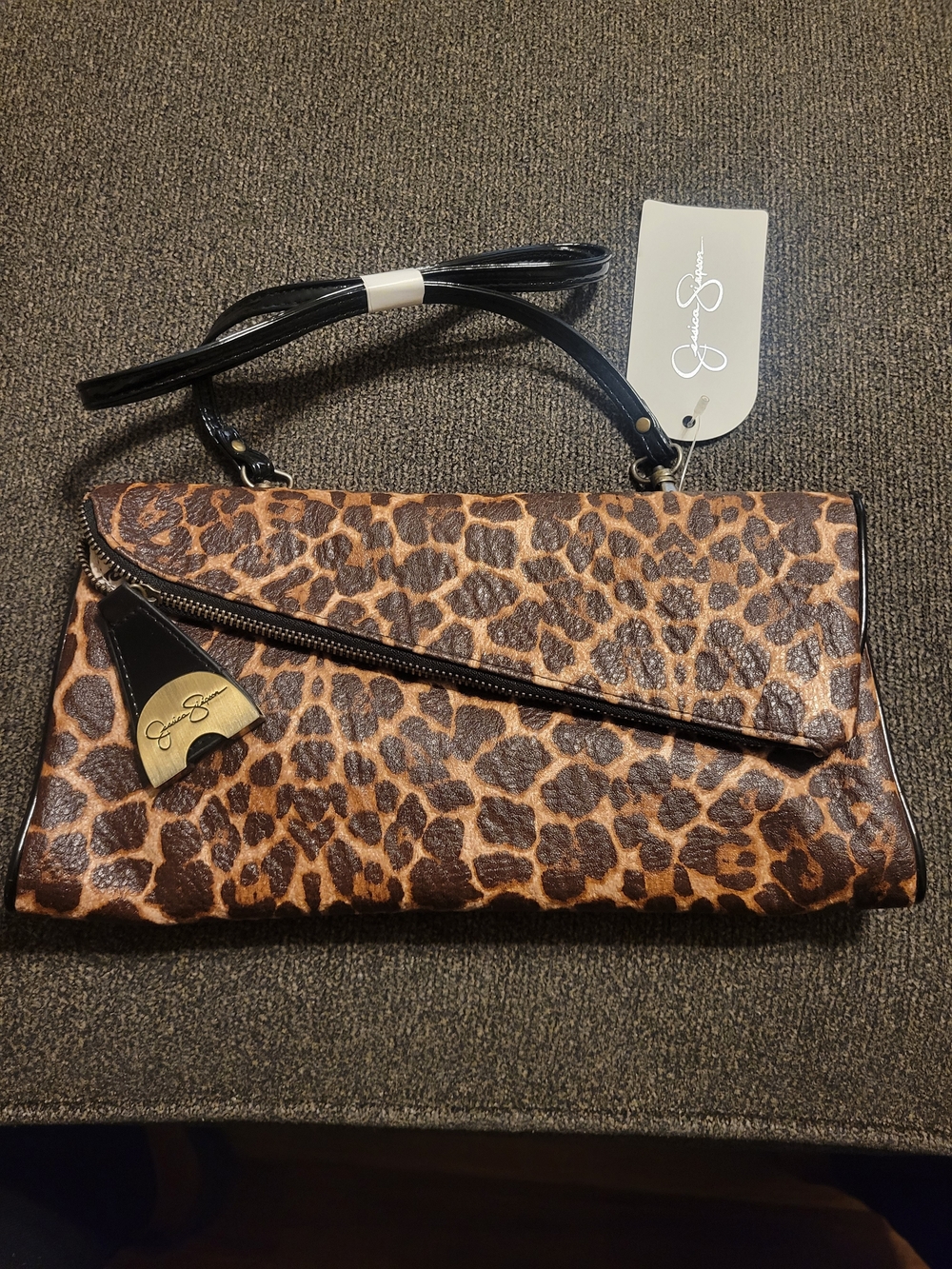 Jessica Simpson Leopard Print Convertible Clutch in Brown and Black